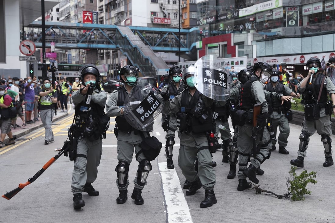 Riot police are deployed near the Sogo department store in Causeway Bay during an anti-national security law protest. Photo: Sam Tsang