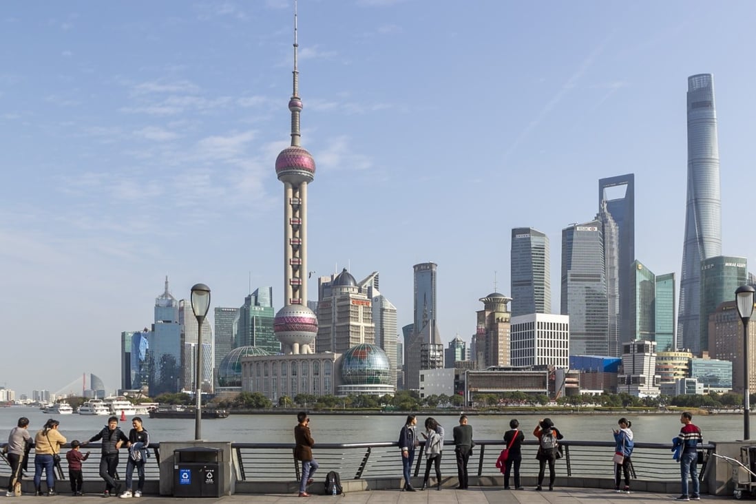 Tourists visit the Bund in Shanghai. Japanese businesses in China remain optimistic about the Chinese market, according to the white paper. Photo: Xinhua