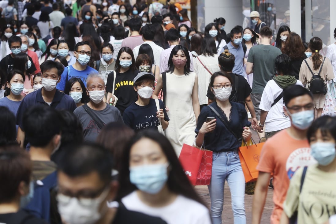 With Covid-19 numbers easing, the crowds are back in Causeway Bay, on September 13. As the winter flu season draws closer, the focus must be on influenza vaccines to reduce the risk of public hospitals being overwhelmed by both flu and Covid-19 patients. Photo: Edmond So