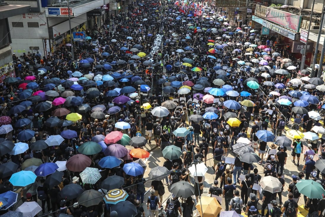 Tens of thousands take to the streets in Hong Kong’s Causeway Bay last year on October 1. Photo: Felix Wong