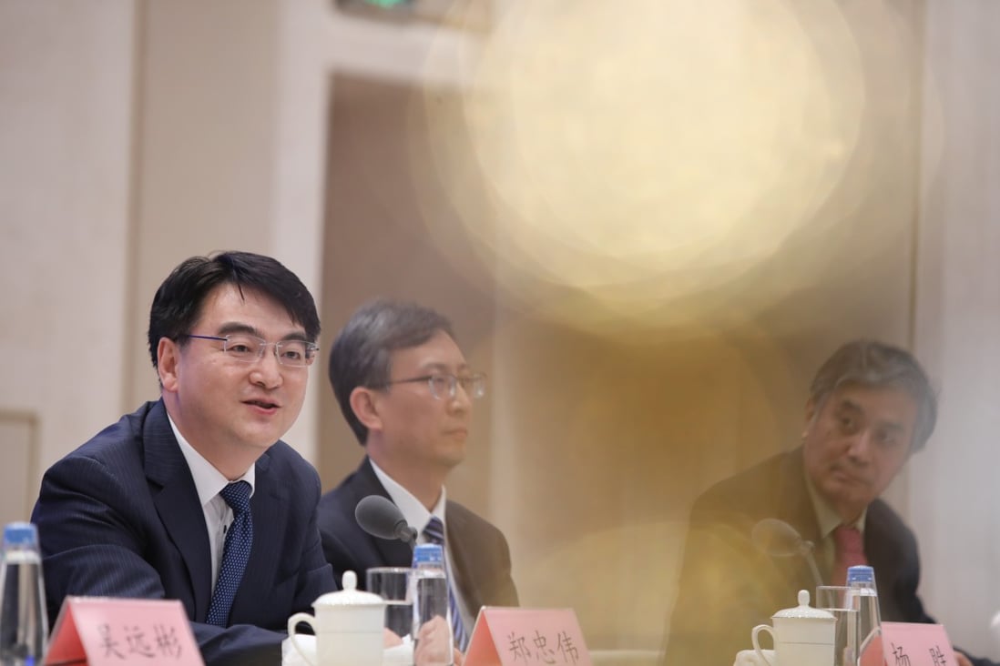 Zheng Zhongwei (left) from the National Health Commission, says China has been in talks with organisations involved in Covax to distribute the vaccine to developing countries. Photo: Simon Song