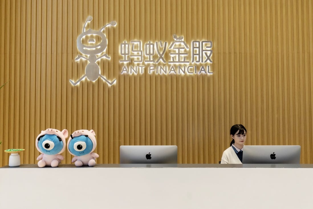An employee works at a reception counter in the lobby of the Ant Financial headquarters in Hangzhou, China, on Thursday, Oct. 17, 2019. Photo: Bloomberg