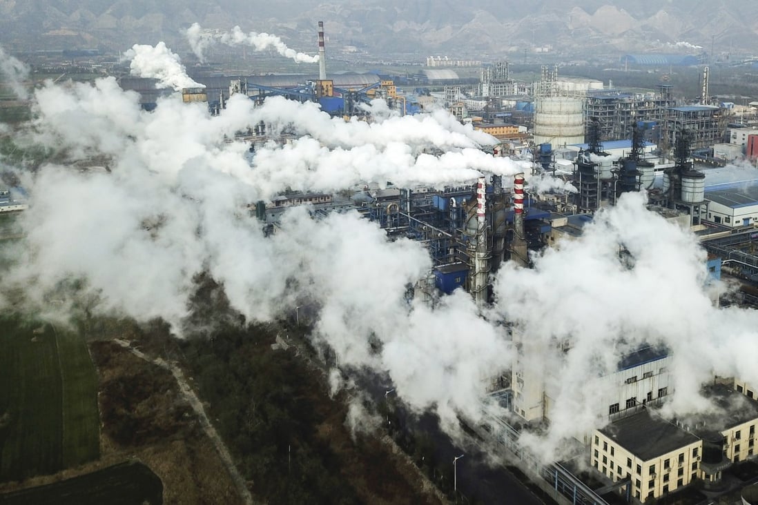 Smoke and steam rise from a coal processing plant in Hejin in central China’s Shanxi province. Chinese President Xi Jinping has said China will aim to stop pumping additional carbon dioxide into the atmosphere by 2060. Photo: AP Photo