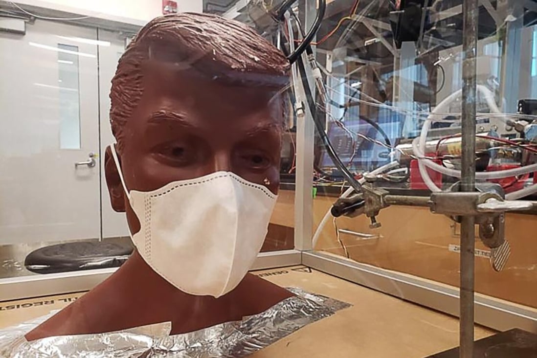 Origami and commercial masks were tested on a mannequin in a chamber filled with tracing particles. Photo: James Smith/University of California, Irvine
