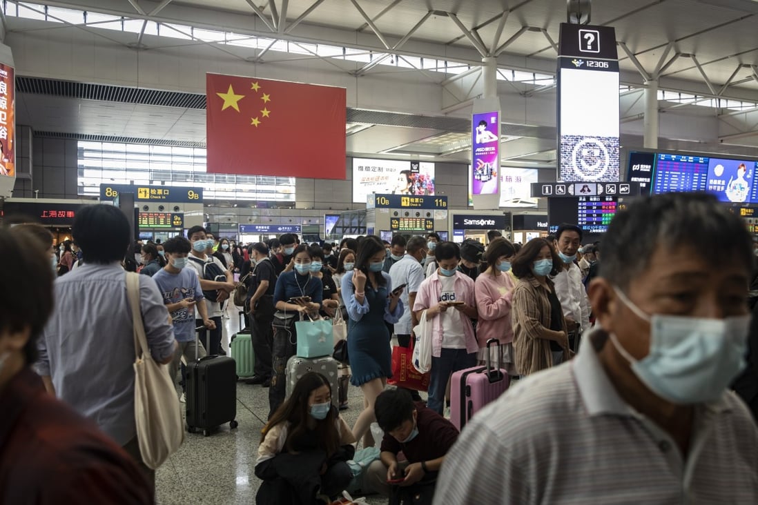 Passengers wait in the departure hall of Hongqiao High-speed Railway Station in Shanghai, China, on Wednesday. Photo: Bloomberg