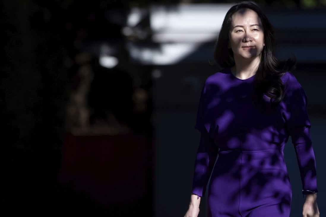 Meng Wanzhou, chief financial officer of Huawei Technologies, leaving her home to attend a court hearing in Vancouver on Tuesday. Photo: The Canadian Press via AP