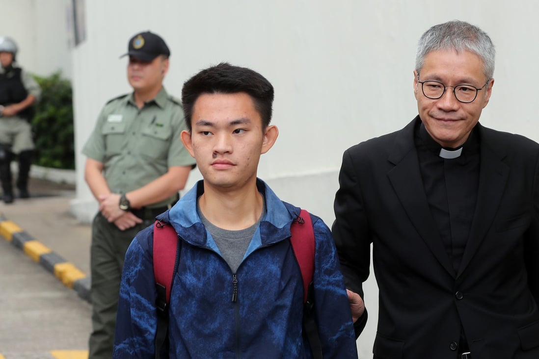 Chan Tong-kai, pictured with Reverend Canon Peter Koon, who has been assisting the murder suspect. Photo: Sam Tsang