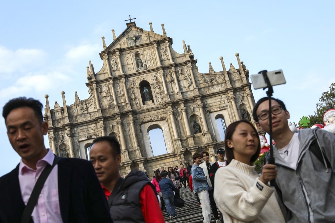 Tourists at the Ruins of St. Paul's site in Macau on 12 December 2019. Photo: Nora Tam