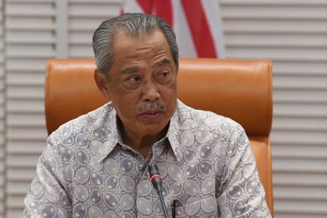 Malaysian Prime Minister Muhyiddin Yassin chairs a special meeting of the National Security Council on Coronavirus measures on Saturday. A minister at the meeting has since contracted Covid-19. Photo: DPA