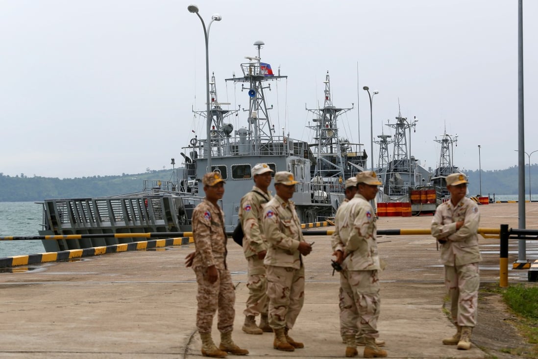 Sailors stand guard near patrol boats at Ream Naval Base in Sihanoukville, Cambodia in July 2019. Photo: Reuters
