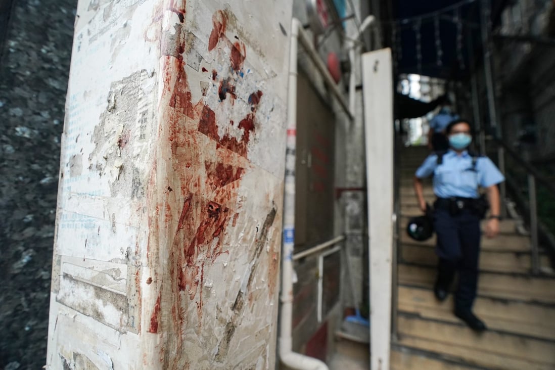 Blood stains can be seen at the site of a brawl that erupted in Tsim Sha Tsui. Photo: Felix Wong