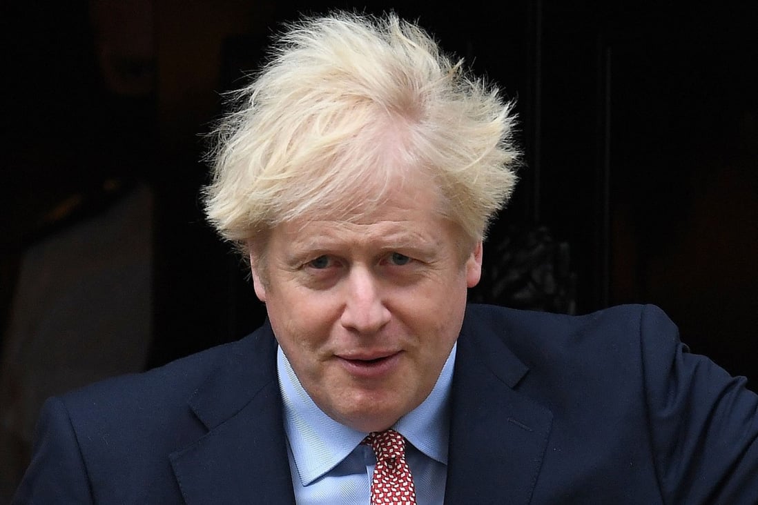 Britain's Prime Minister Boris Johnson leaves 10 Downing Street before giving a virtual speech to the Conservative Party's annual conference, in which he sought to offer a vision of a prosperous future fuelled by green energy. Photo: AFP