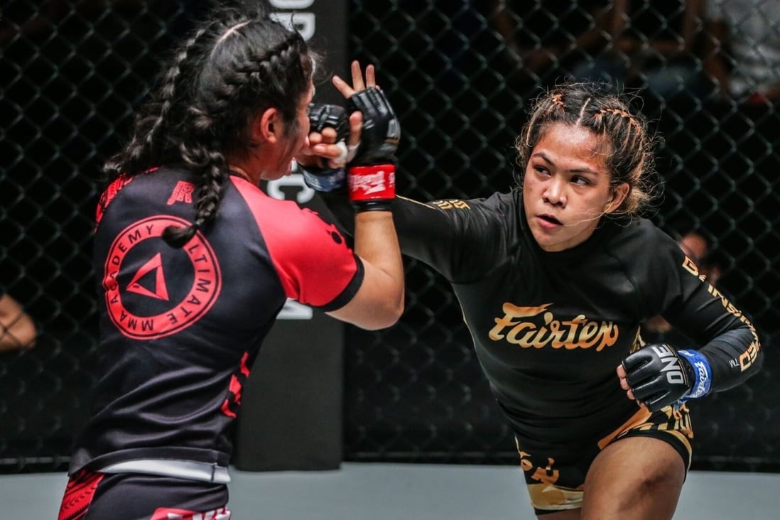 Denice Zamboanga throws a punch at Jihin Radzuan. Photos: ONE Championship