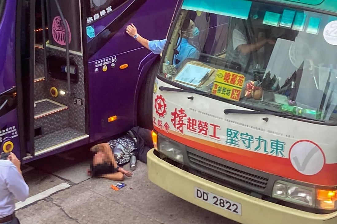 Tourist bus driver beaten unconscious with metal water bottle in Hong