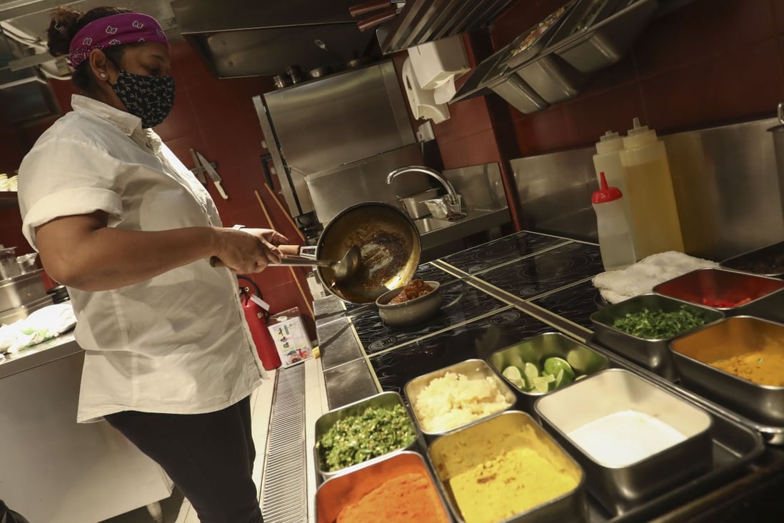 Gisela Alesbrook prepares chicken curry at Hotal Colombo – a staff-only dish that led to the opening of the Sri Lankan restaurant. Photo: Jonathan Wong