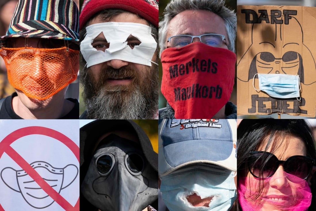 Portraits of people and placards from a protest against masks and virus restrictions Konstanz, southern Germany. Photo: AFP