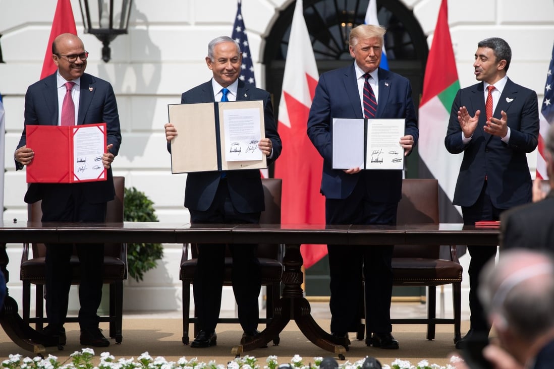 (Left to right) Bahrain’s Foreign Minister Abdullatif al-Zayani, Israeli Prime Minister Benjamin Netanyahu, US President Donald Trump and UAE Foreign Minister Abdullah bin Zayed Al-Nahyan at the signing of the Abraham Accords at the White House on September 15. Photo: AFP