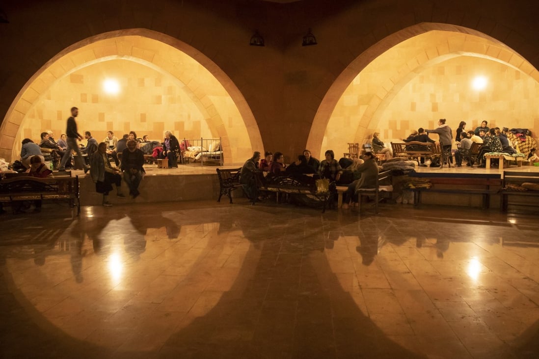 People take refuge in a bomb shelter in Stepanakert, Nagorno-Karabakh. Photo: AP