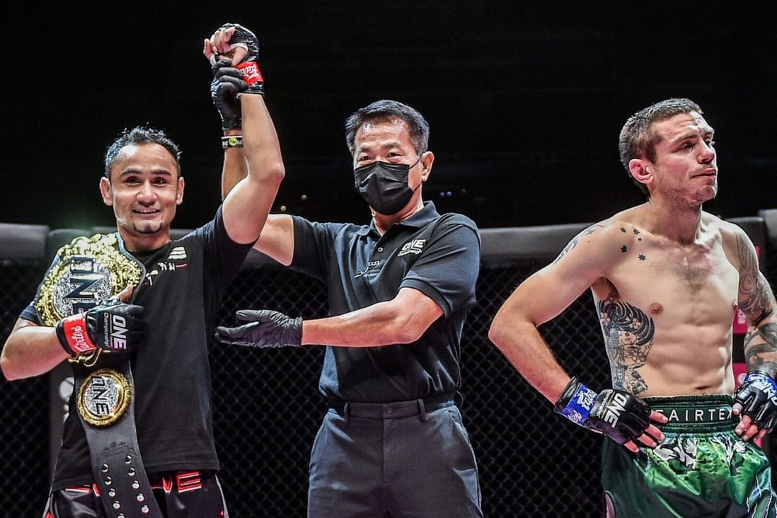 Sam-A Gaiyanghadao’s arm is raised as Josh Tonna looks dejected after the Reign of Dynasties main event in Singapore. Photos: ONE Championship