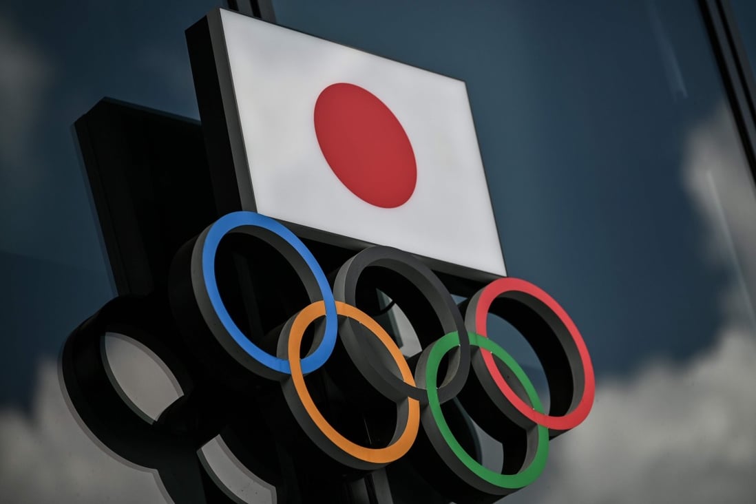 The Olympic Rings and the Japanese flag pictured outside the Olympic Museum in Tokyo. Photo: AFP