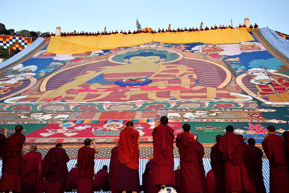 The “sunning of the Buddha” ceremony is held at the Drepung Monastery in Lhasa in August. A senior official said there would be an “orderly” opening up in Tibet. Photo: Xinhua
