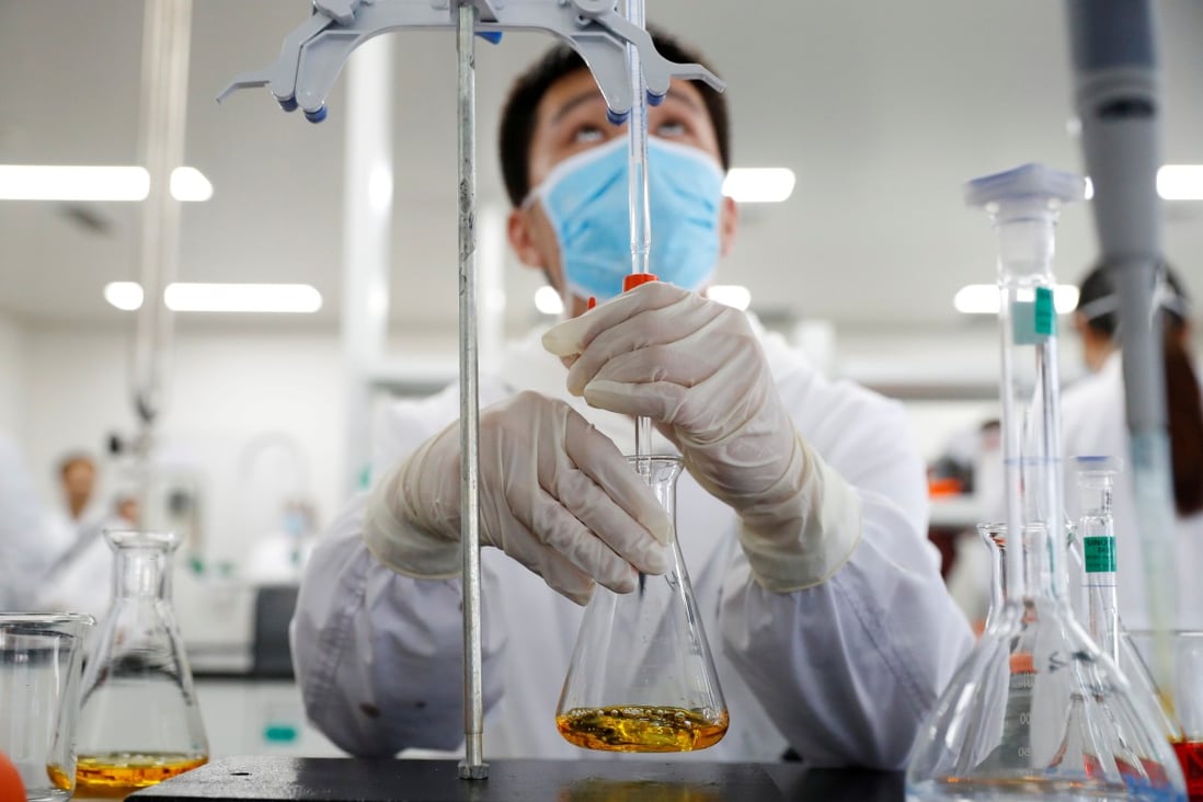 A man works in a Sinovac Biotech laboratory in Beijing. An experimental Covid-19 vaccine developed by the company is one of four Chinese candidates in the final stage of human trials. Photo: Reuters