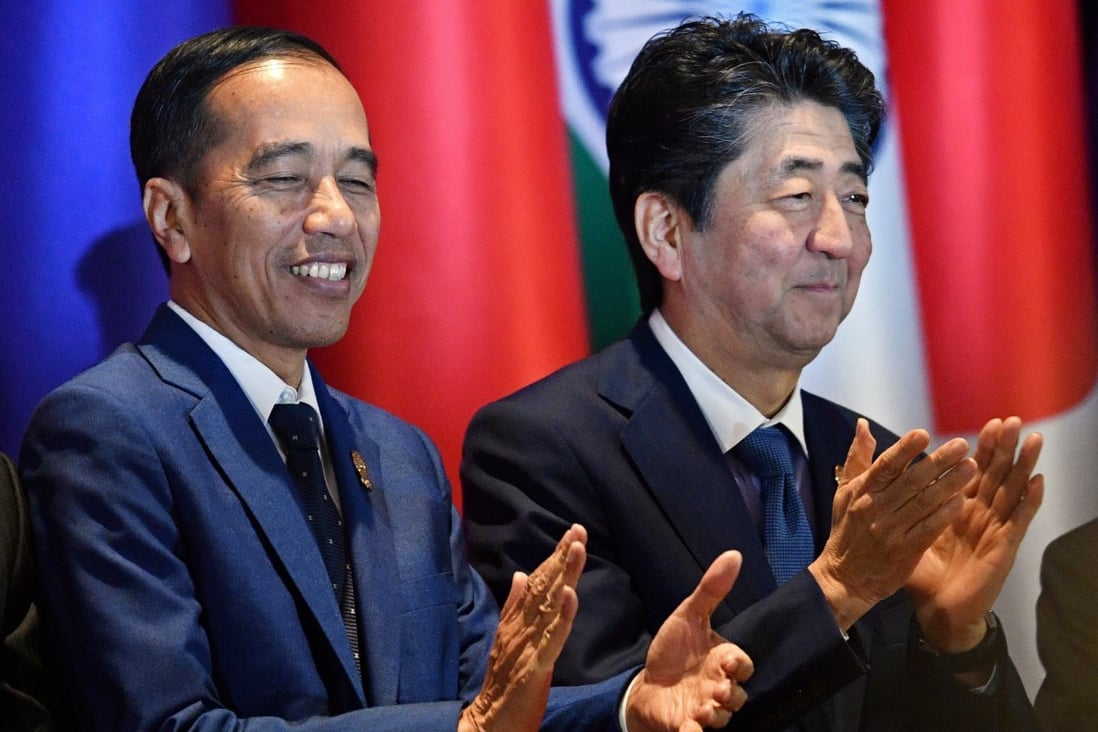 Indonesian President Joko Widodo, left, and then Japanese prime minister Shinzo Abe attend the East Asia Summit in Bangkok on November 4, 2019. Japan has long-standing ties with Southeast Asia, and those ties are likely to continue growing with the region’s centrality in the notion of the Indo-Pacific. Photo: Reuters