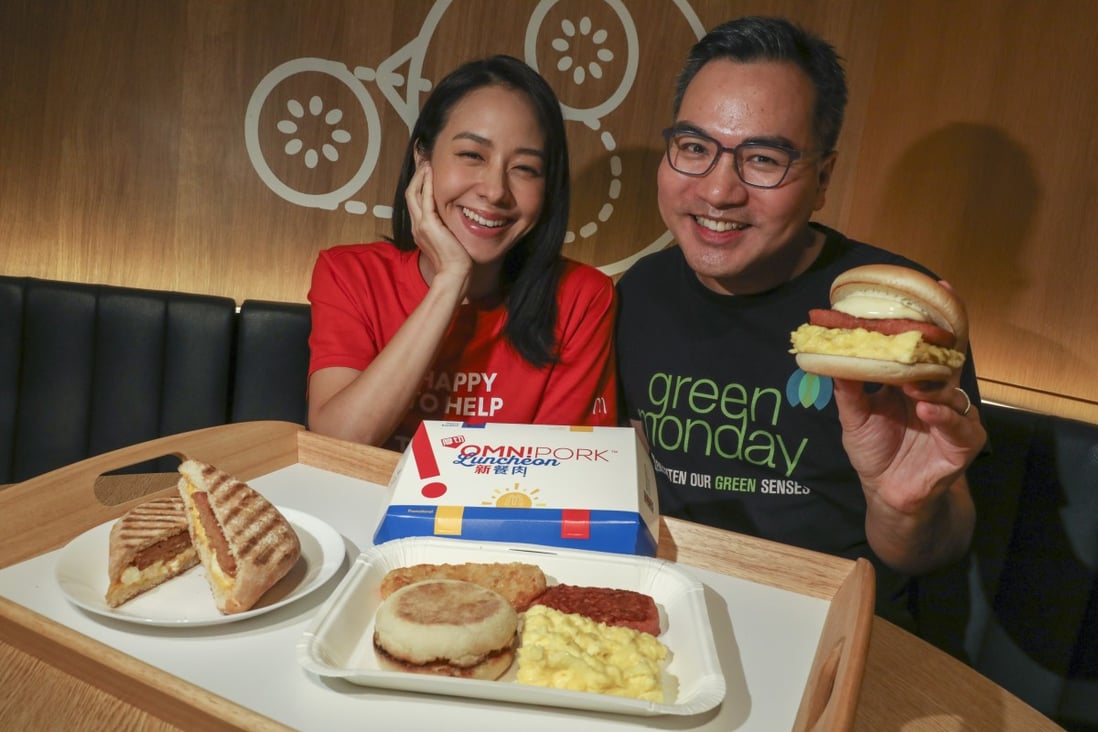 OmniFoods CEO and co-founder David Yeung and Green Monday celebrity ambassador Karena Lam show off McDonald’s and McCafe dishes featuring OmniPork plant-based luncheon meat. Photo: Nora Tam