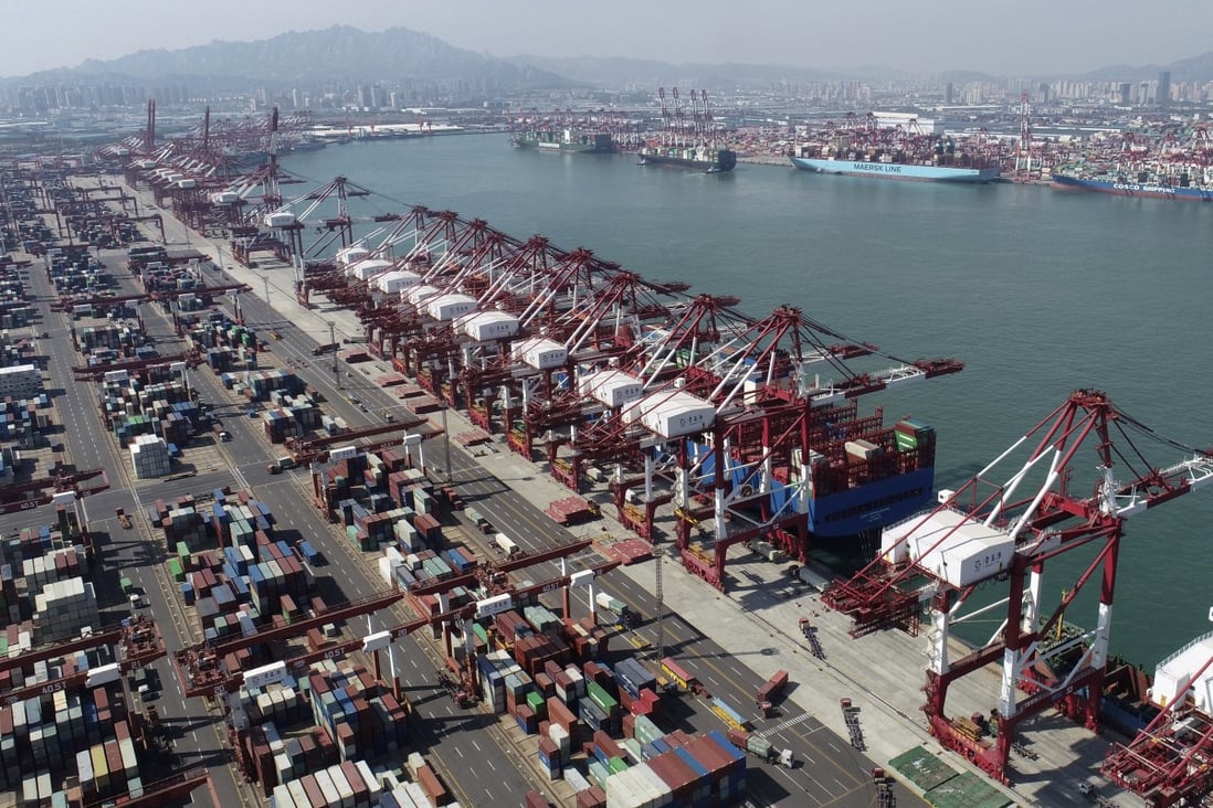 Container ships are docked at a container port in Qingdao, in eastern China’s Shandong Province. Photo: AP
