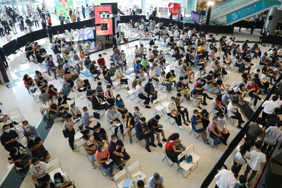 Potential homebuyers line up for the sale of the CK Asset’s Sea To Sky project at Fortune Metropolis mall in Hung Hom, on September 26, 2020. Photo: Dickson Lee
