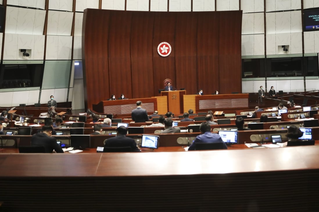 Lawmakers wearing masks attend a Legco meeting at Legislative Council Complex in Tamar. Photo: K. Y. Cheng