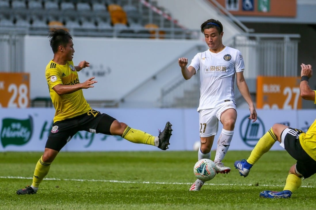 Jordan Lam on the ball for R&F in the Hong Kong Premier League game against Lee Man. Photo: HKFA