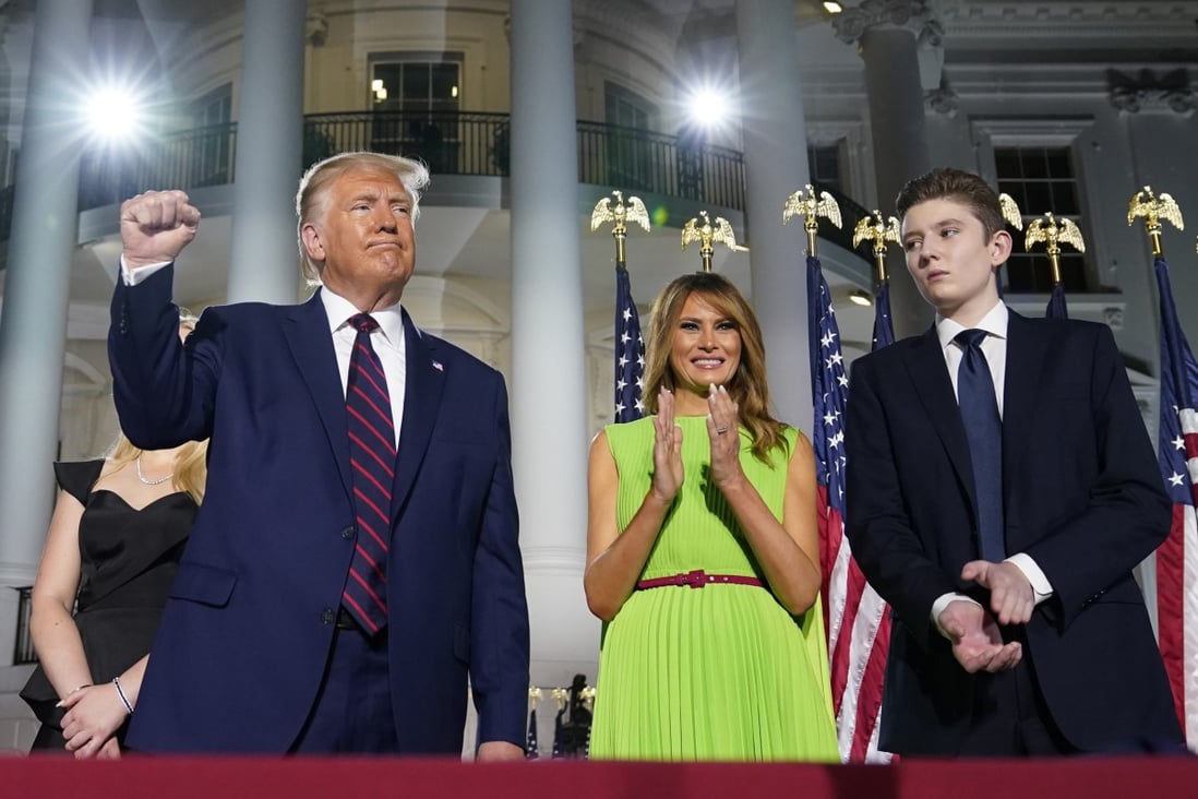 US President Donald Trump, first lady Melania Trump and Barron Trump stand on the South Lawn of the White House on the fourth day of the Republican National Convention in August. Photo: AP