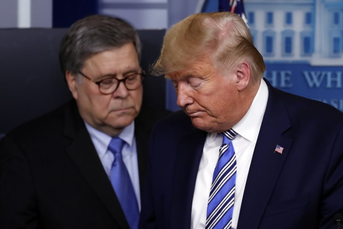 US Attorney General Bill Barr and US President Donald Trump. File photo; AP