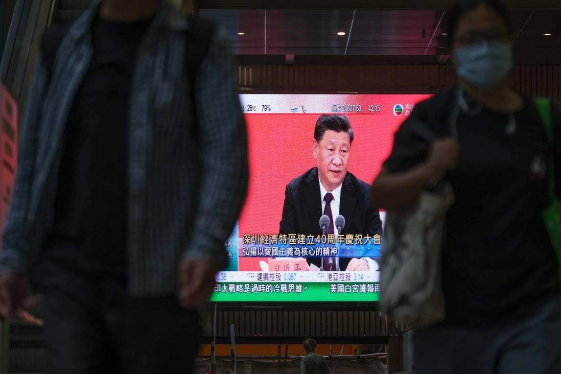 President Xi Jinping’s Shenzhen speech is shown on a public screen in Hong Kong. Photo: Bloomberg