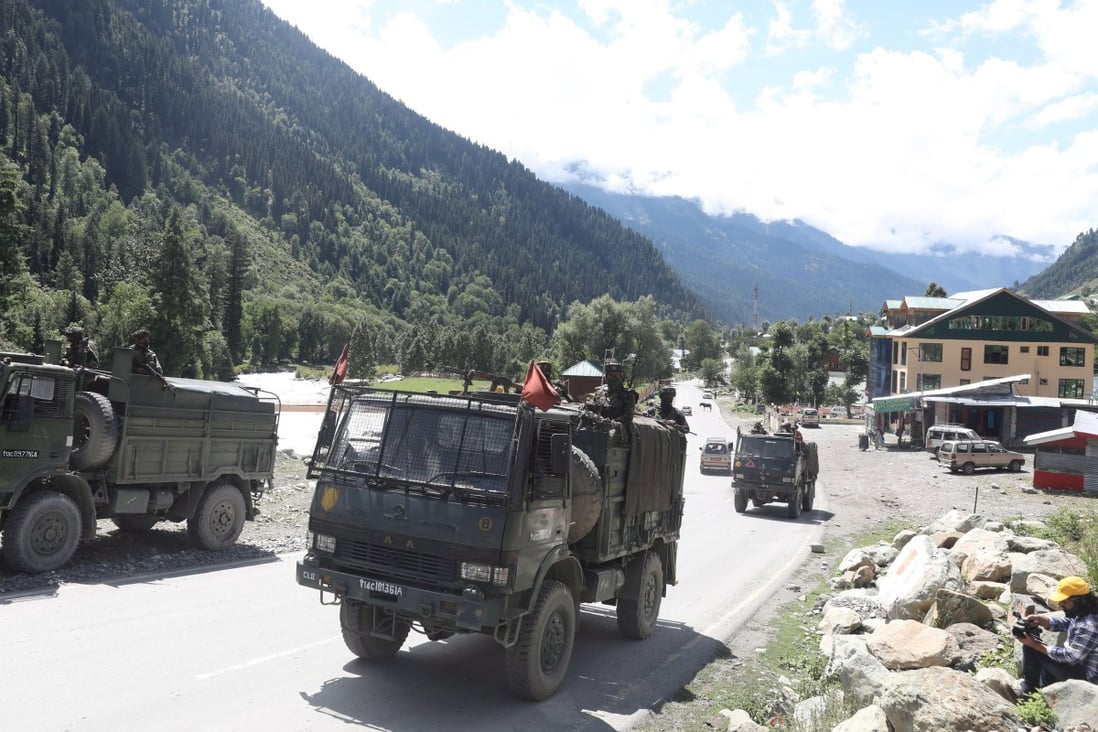 Indian army vehicles move along a highway leading to Ladakh, which Beijing says it does not recognise. Photo: EPA-EFE