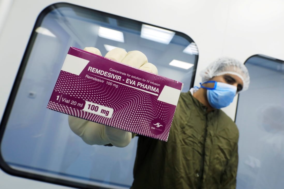 A lab technician shows the coronavirus treatment drug remdesivir at Eva Pharma Facility in Cairo, Egypt. Photo: Reuters