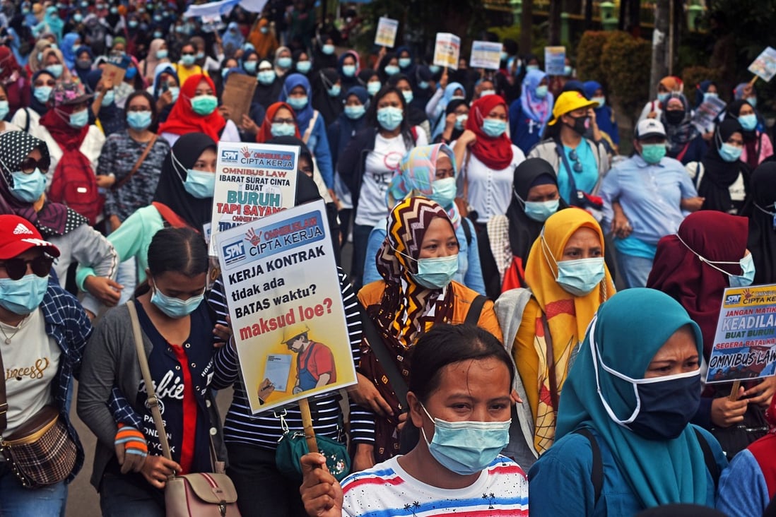 Members of Indonesian trade unions protest against the new jobs bill in Serang, Banten Province on October 14, 2020. Photo: Antara Foto via Reuters