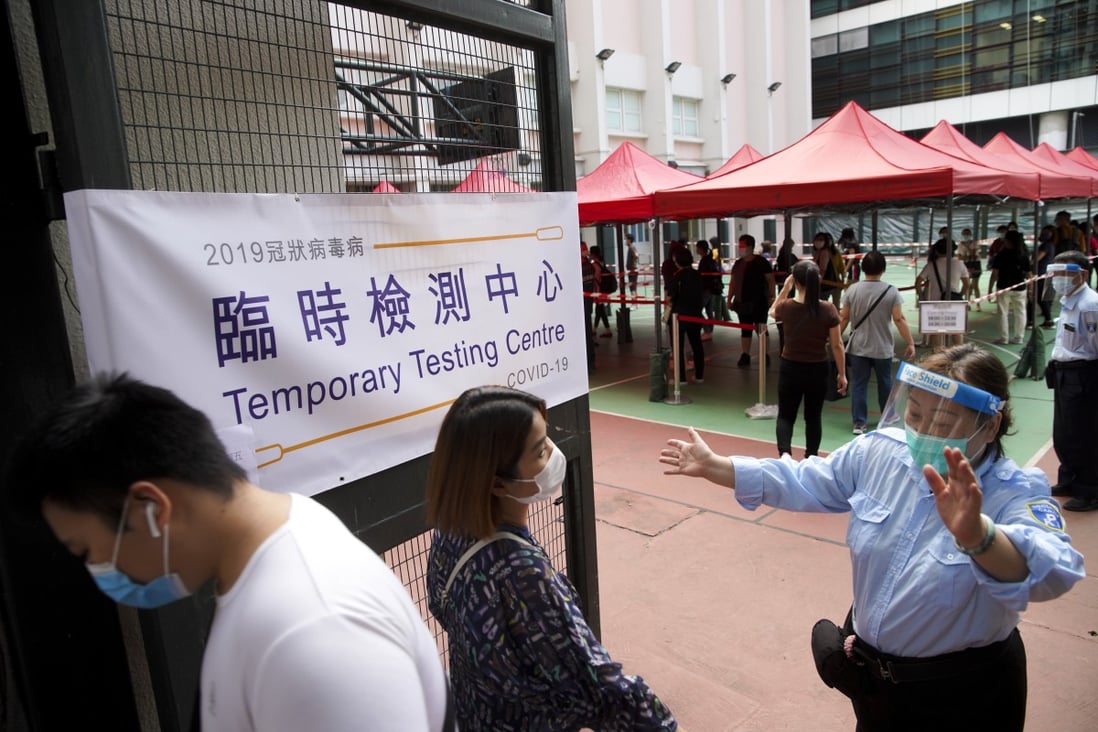 People queue for a coronavirus test at the Yau Tsim Mong temporary testing centre. Photo: Winson Wong