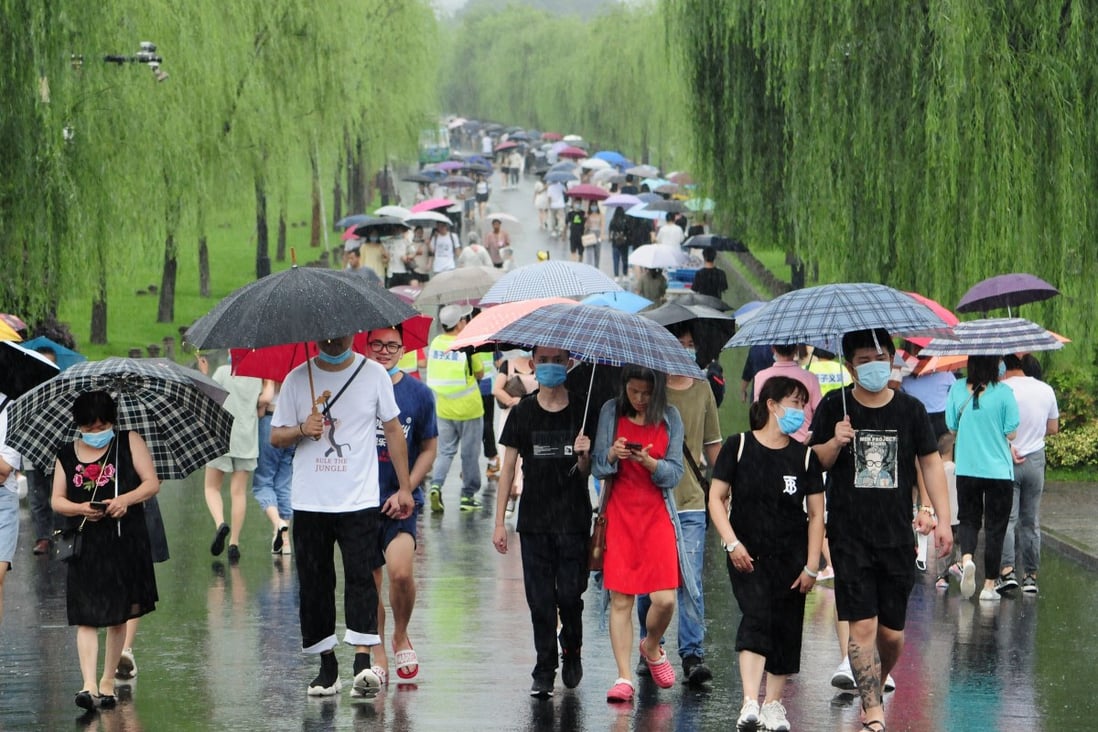 Residents of Hangzhou, the capital of Zhejiang province. Photo: Getty Images