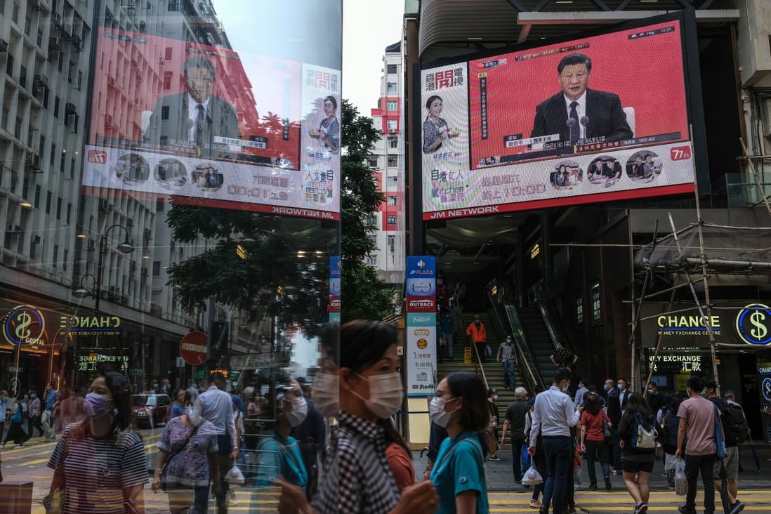 President Xi Jinping’s speech in Shenzhen is shown on an outdoor screen in Hong Kong last Wednesday. Photo: Bloomberg