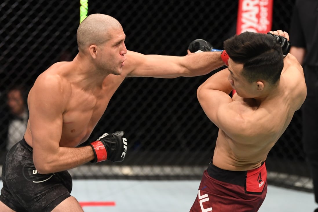Brian Ortega punches ‘The Korean Zombie’ Jung Chan-sung in their featherweight bout during the UFC Fight Night event inside Flash Forum on UFC Fight Island on October 18, 2020 in Abu Dhabi, United Arab Emirates. Photos: Josh Hedges/Zuffa LLC via Getty Images