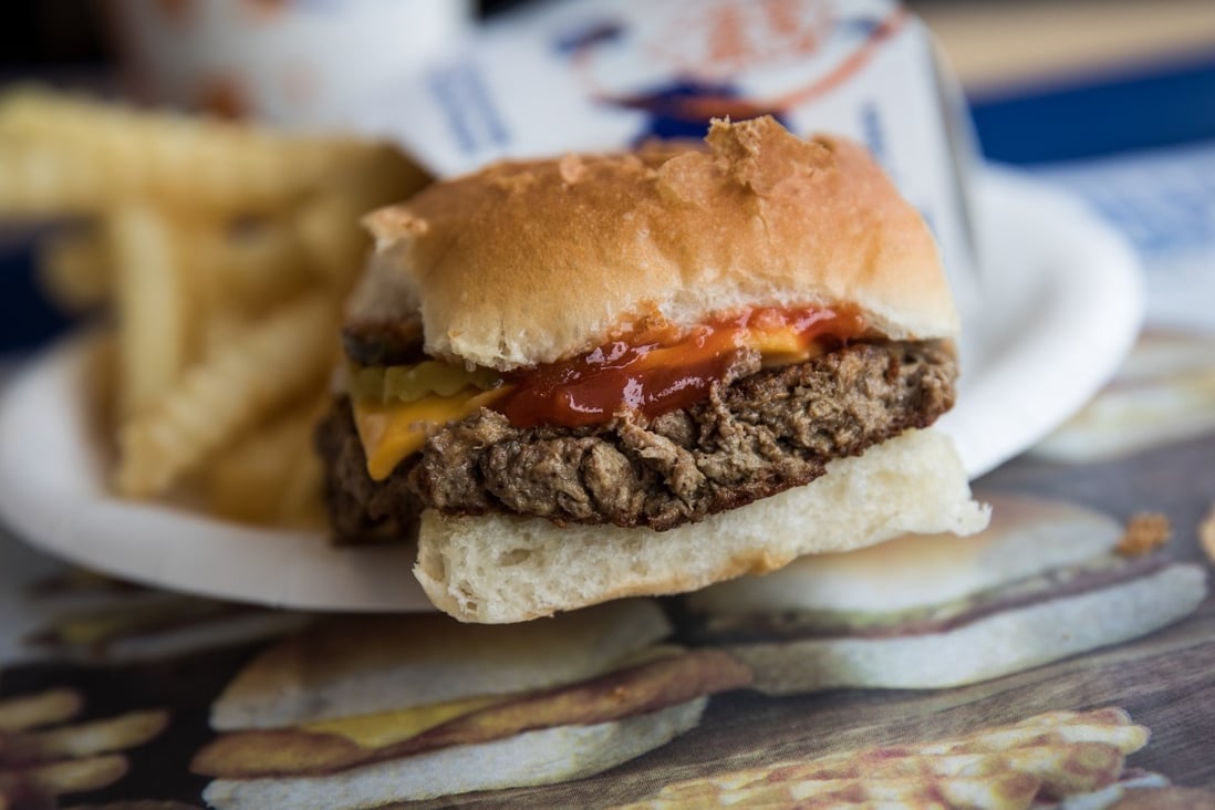 A meatless Impossible slider is served at White Castle restaurant in Queens, New York. Health experts say that adopting a plant-based diet will help head off the threat of a pandemic far worse than Covid-19 – that of H7N9 bird flu, spread from battery chicken farms. Photo: Getty Images