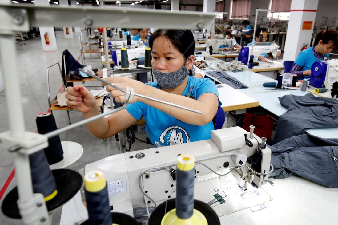 Workers at a garment export factory in Hanoi. Vietnam has become a hub for foreign direct investment within the past decade. Photo: Reuters