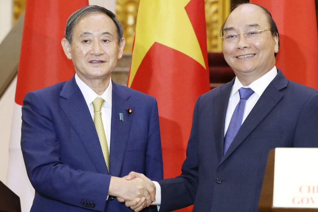 Japanese Prime Minister Yoshihide Suga (left) agreed with his Vietnamese counterpart Nguyen Xuan Phuc for the countries to work together on issues including the South China Sea. Photo: Kyodo