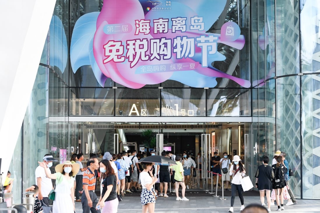People shop at the Sanya International Duty Free Shopping Complex in Sanya, Hainan, on August 6. The Chinese island has long been a tourist destination but new duty-free shopping quotas and closed international borders have added to its popularity among Chinese tourists. Photo: Xinhua