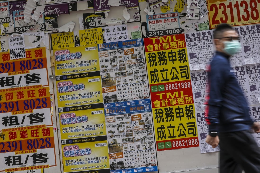 A pedestrian walking past closed retail shops in Mong Kok on 24 February 2020. Photo: K.Y. Cheng