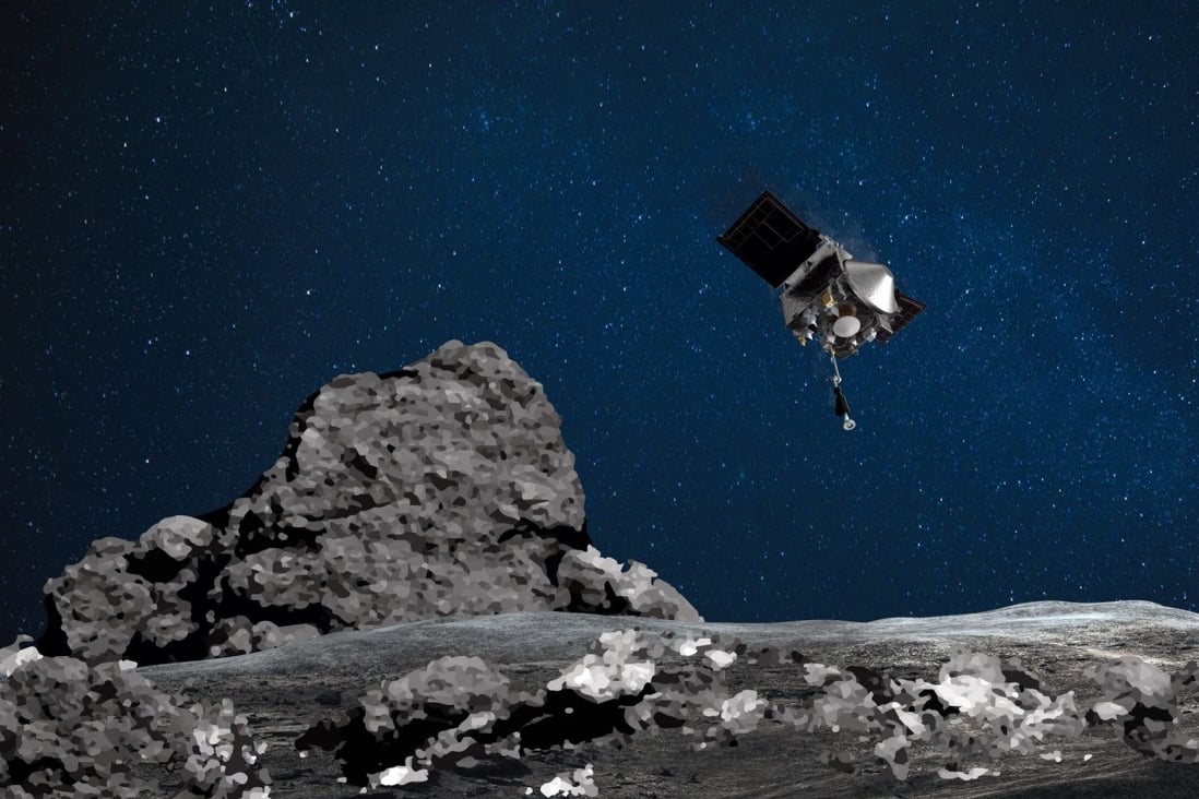 An artist's rendering depicts the Osiris-Rex spacecraft descending towards asteroid Bennu to collect a sample from the surface. Photo: Nasa