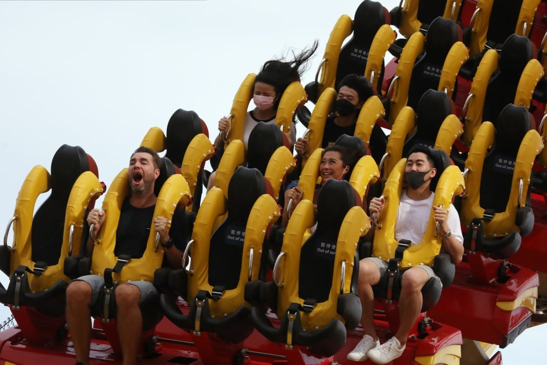 Visitors enjoy a ride on the roller coaster at Ocean Park on September 18, the day the theme park reopened after being shut for two months over Covid-19 social distancing measures in Hong Kong. Photo: K.Y. Cheng