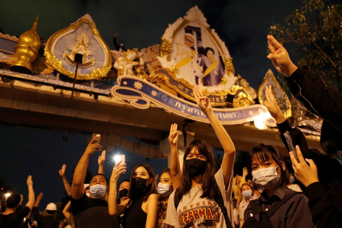 Pro-democracy protesters make a three-finger salute during an anti-government protest in Bangkok on October 21. Photo: Reuters